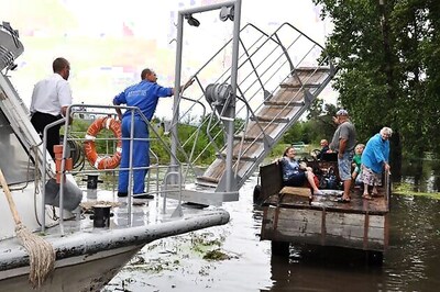 China floods: Homes washed away, more than 200 dead or missing