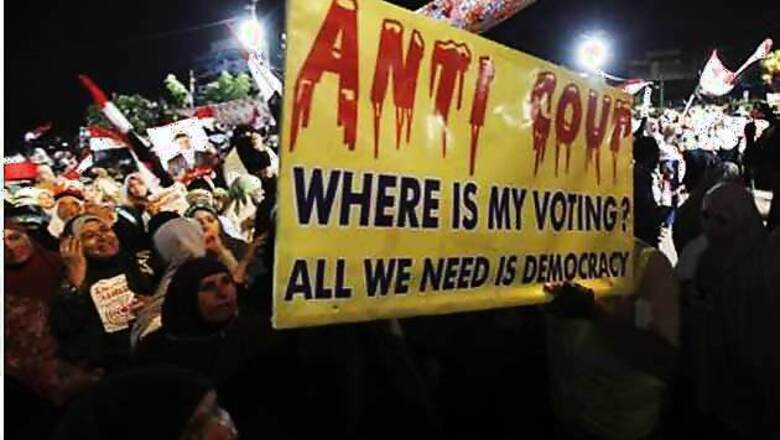 Mohamed Morsi supporters rally in Egypt, army shows muscle