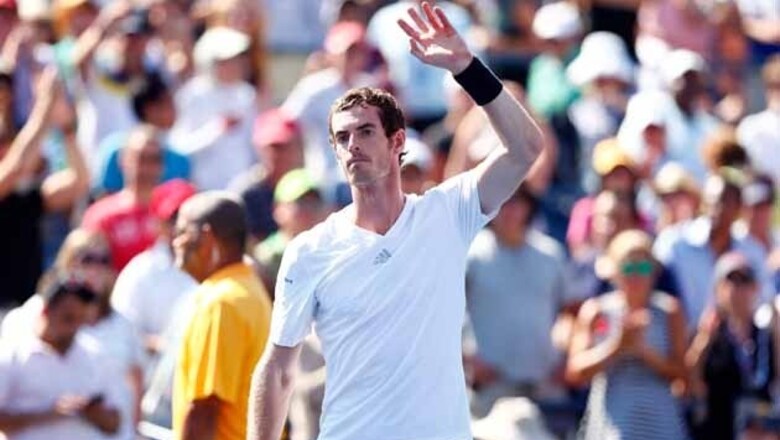 Murray, Venus grind out wins at steamy US Open