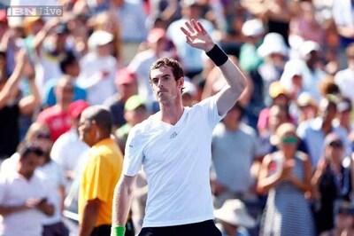 Murray, Venus grind out wins at steamy US Open