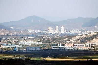 North Korea brings aid supplies to border town under lockdown - state media