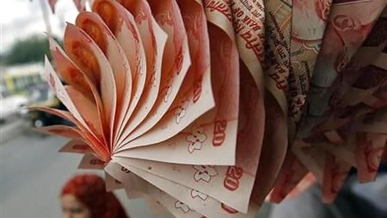 Rupee opens weak at 62.90 vs $ against Wednesday's close of 62.58