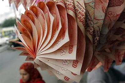 Rupee opens weak at 62.90 vs $ against Wednesday's close of 62.58