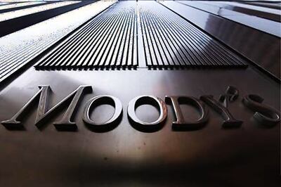 Moody's cuts ratings of world's 15 biggest banks