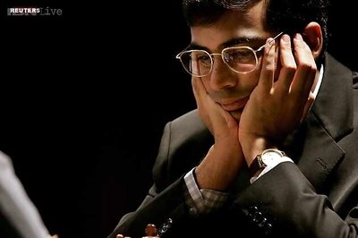 Viswanathan Anand stays ahead with draw against Karjakin