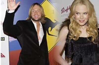 Nicole reunites with hubby in Sydney