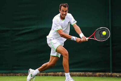 Year after beating Nadal, Rosol loses in 1st round
