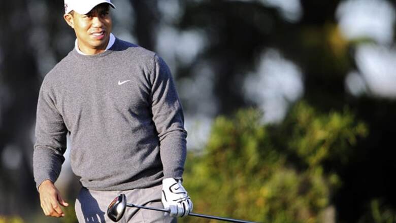 Woods says neck injury not related to crash