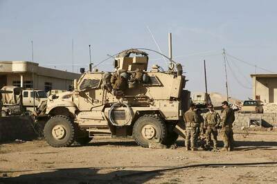Residents of Northeast Syrian City Throw Potatoes at Departing US Troops