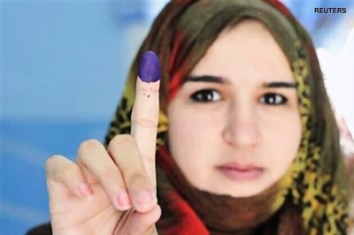 Joyful Libyans brave violence to grasp free vote