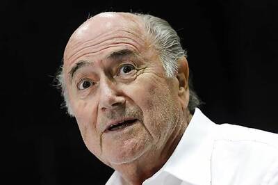 Sepp Blatter defiant as top sponsors demand resignation