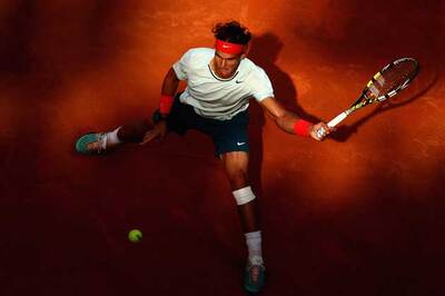 Emotional Nadal reaches Rome final, Serena rolls on