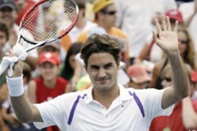 Teenager stuns Sharapova, Federer tames Isner