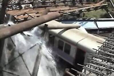 Water pipe falls on Mumbai train; 2 dead