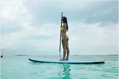 Disha Patani Gets 'Aquaman Feels' Posing on Surfboard in the Sea in a Yellow Bikini