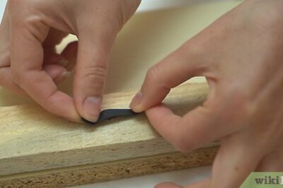 How to Use a Rubber Band to Unscrew Stripped Screws