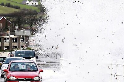 Hurricane-force winds wreak havoc in Britain, Thames Barrier to remain shut