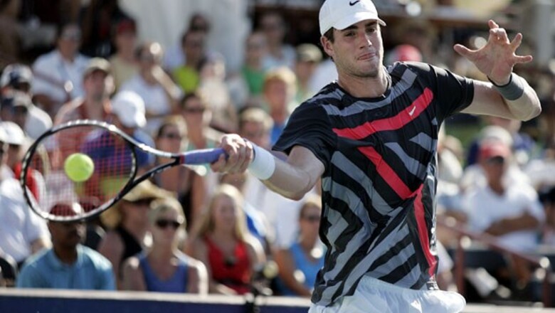 US Open: Marathon man Isner wins easily