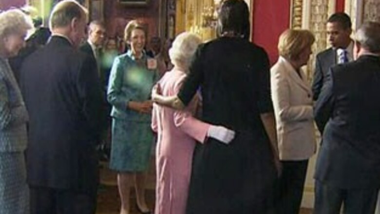 Michelle Obama charms Queen away from protocol