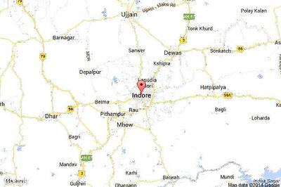 Two killed, 77 injured as bus overturns and falls into drain