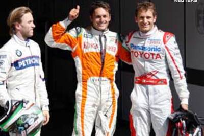 Force India's Fisichella takes pole at Belgian GP