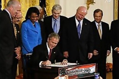 Signed, sealed: Bush makes nuclear deal law