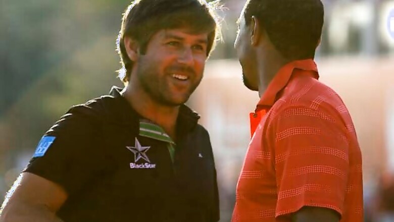 Rock beats McIlroy, Woods for Abu Dhabi title
