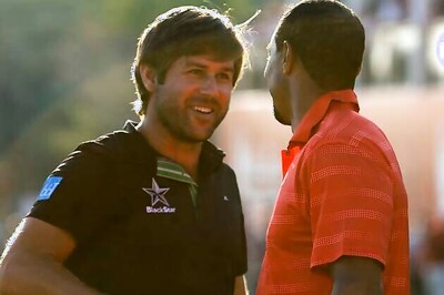 Rock beats McIlroy, Woods for Abu Dhabi title