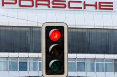 Porsche Chief steps down as VW prepares to take over