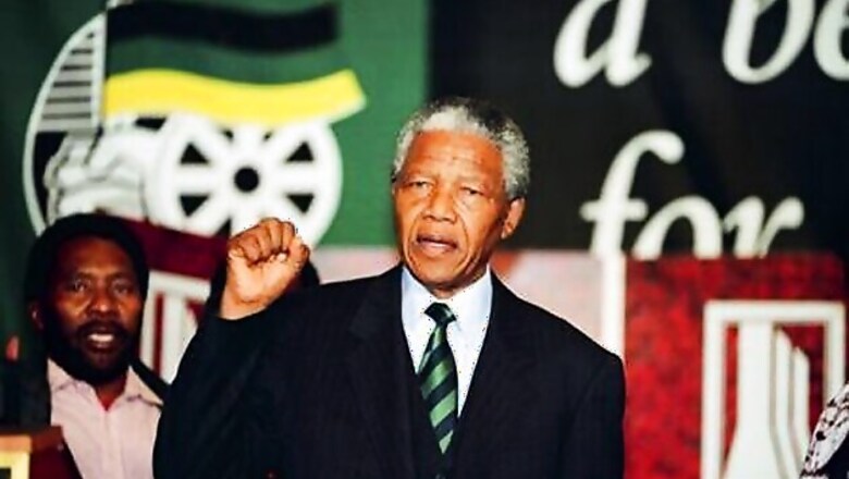 South Africa's Mandela improving as Obama flies in