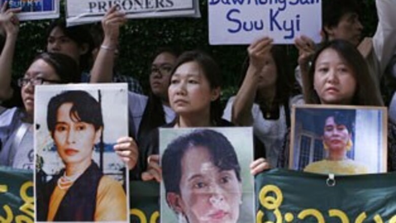 Suu Kyi begins trial, EU threatens sanctions
