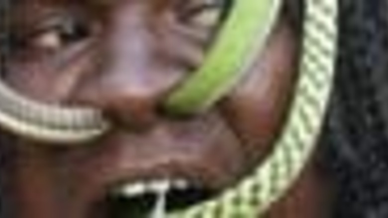 Pics: He's got snakes in mouth, nose