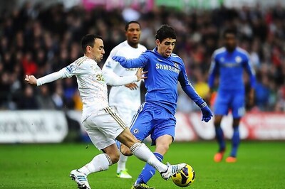 Chelsea lose top spot after 1-1 draw at Swansea