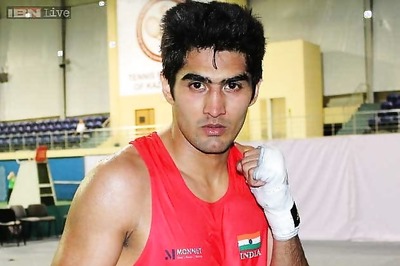 Down with viral but Vijender dominates World Championship opener