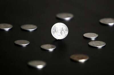 Rupee up by 4 paise against dollar in early trade