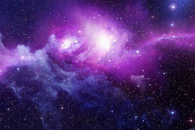 Exploring Space: Cosmic Clouds of Cold Gas Give Birth to Giant Galaxies