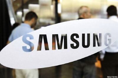 Samsung forecasts record profit but shares tumble