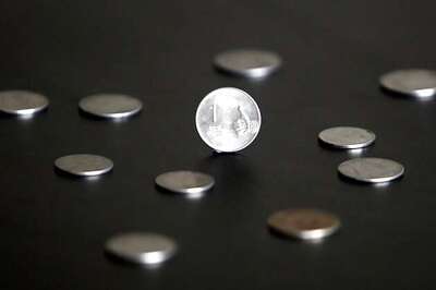 Rupee rebounds from weak open; caution prevails