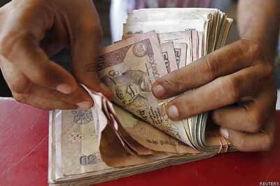 Rupee up 34 paise against dollar in early trade