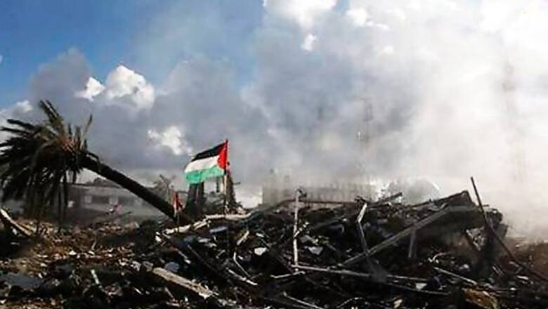 Gaza crowds surge at Israel border fence, 1 dead