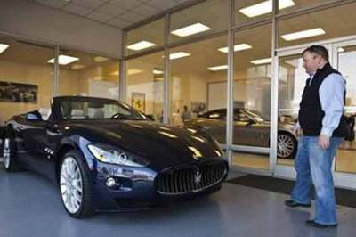 Wall St bankers, publicly modest, eye fancy toys