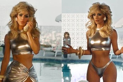 Kim Kardashian Is Retro Queen In New Swimwear Ad; Shows Off Taut Abs In Metallic Bikini; See Pics