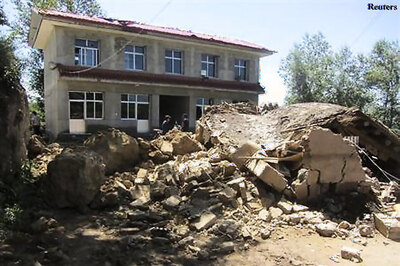 China quake death toll more than doubles to 54, hundreds hurt