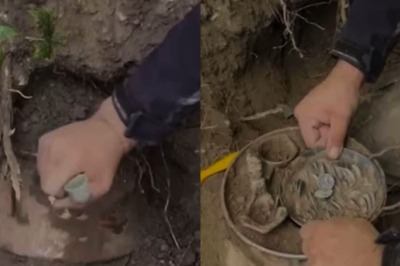 Watch: Man Unearths Pot Filled With Coins During Treasure Hunt