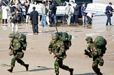 US drafts plan for troop cuts in Iraq