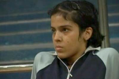 Shuttler Saina retains IIB crown