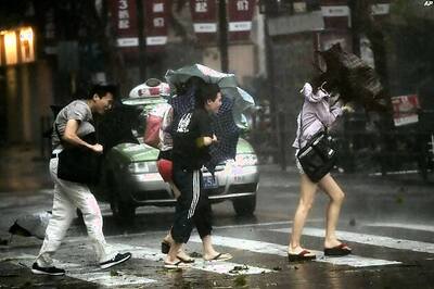 Eastern China, Shanghai battered by typhoon rains