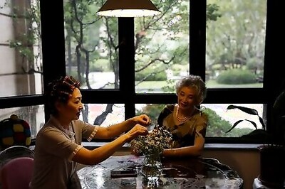 Remove masks, celebrate freedom: fashion grannies return to Beijing street 'catwalk'