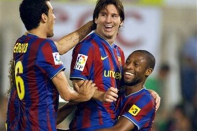 Barcelona ease past Racing Santander
