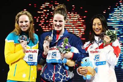 Swimmer Missy Franklin wins 100 metres backstroke gold